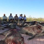 Organizadores-con-parte-de-los-cochinos-cobrados-(2)