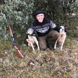 Becadas y perros en trofeo caza y conservación