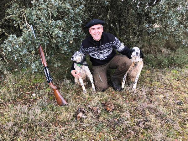 Becadas y perros en trofeo caza y conservación